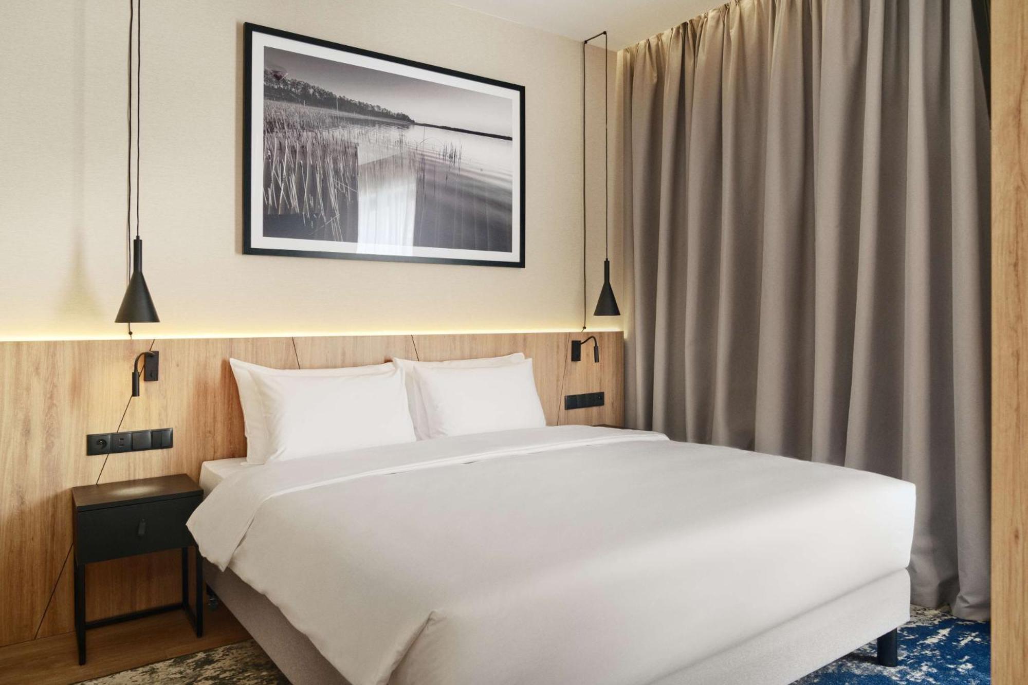 Radisson Blu Resort & Conference Center, Ostroda Mazury Ngoại thất bức ảnh A bedroom at the hotel